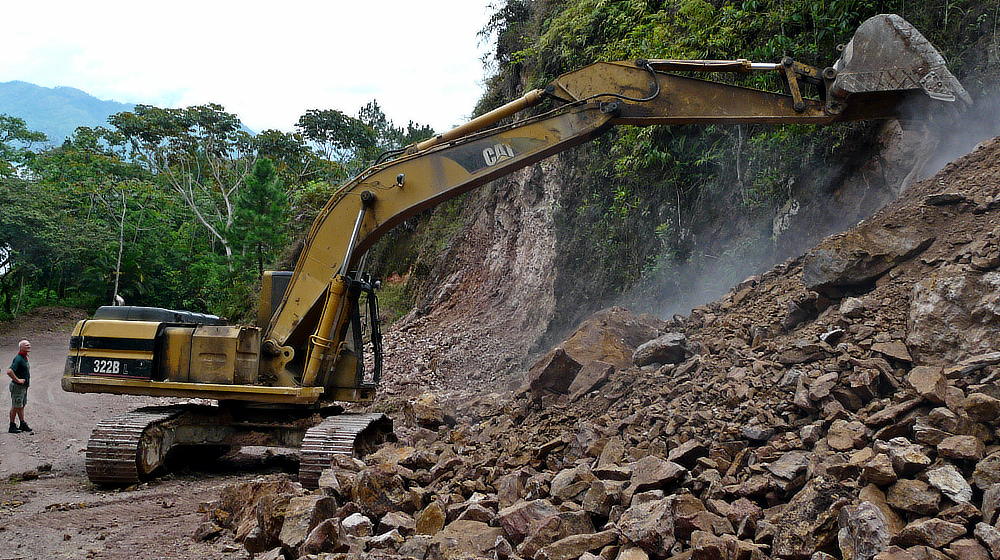 Excavator with arm extended