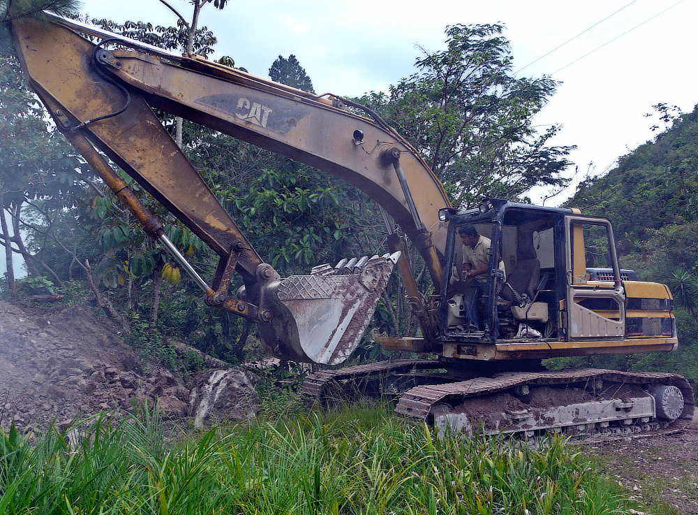 Excavator with arm curled